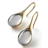 Crystal drop earrings in gold and silver